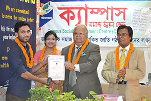 Barrister Nazmul Huda gives Certificates to the Trainees of Free Computer                  Training (Batch 6+7) as Chief Guest; Dr. M Helal presides over. (2013)